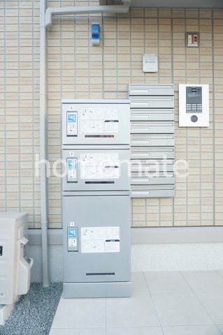 合志市須屋のアパートのエントランス