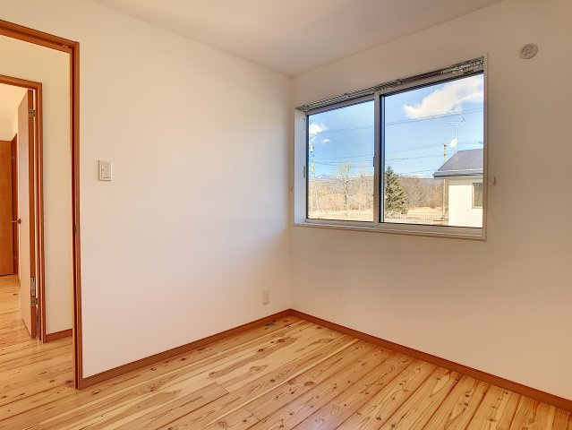 洗練された街並みに集うの洋室