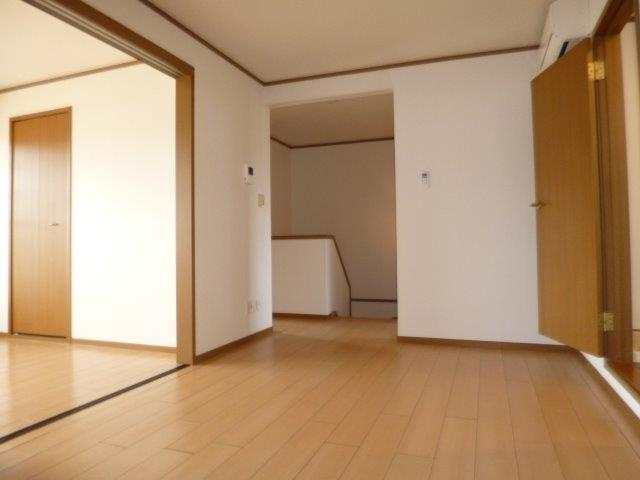 ファミールＦＵＪＩ　Ｂの居間・リビング