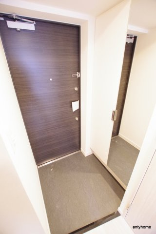 プレサンス OSAKA DOMECITY クロスティ 仲介手数料無料の玄関
