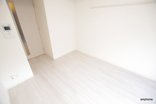 プレサンス OSAKA DOMECITY クロスティ 仲介手数料無料の洋室
