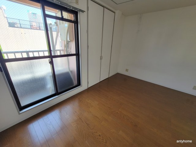 ハイツ丸松　仲介手数料無料の寝室