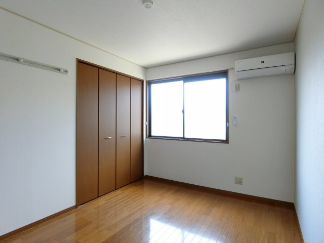 スカイスクレーパーA棟の洋室|101号室のイメージ写真（反転あり）