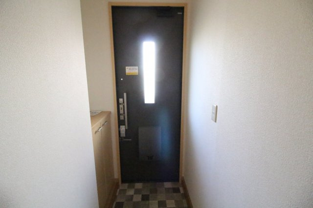 ハピネスヒルズAの玄関