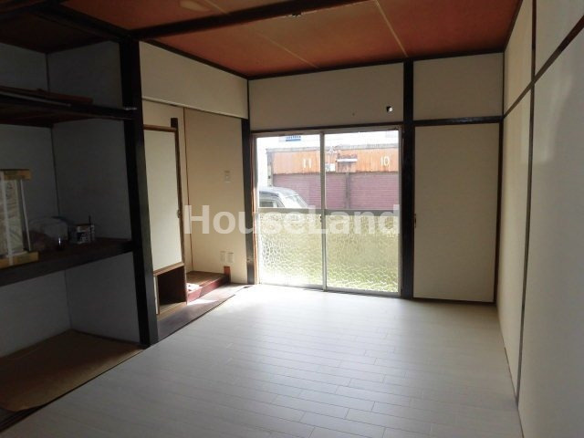 六十谷マンションの寝室