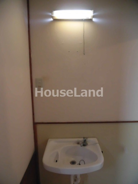 六十谷マンションの洗面所