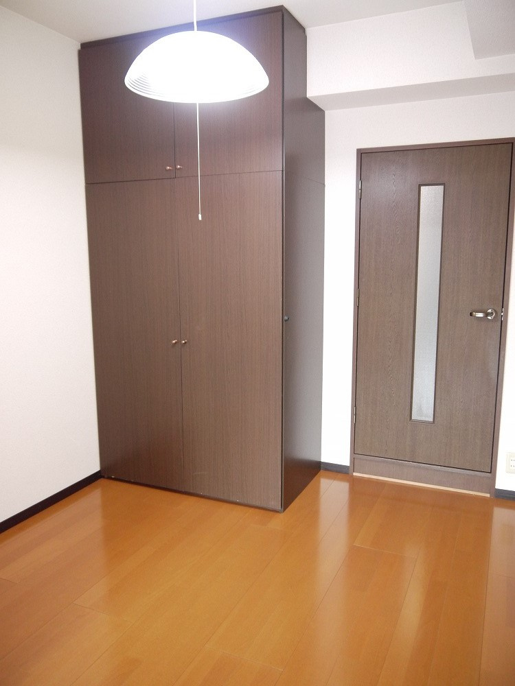 KURIMAマンションの寝室