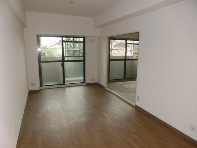 大阪市淀川区三国本町３丁目の賃貸マンションの居間・リビング