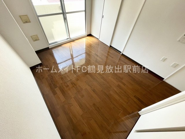 ヴァンスタージュ大阪城EASTの洋室