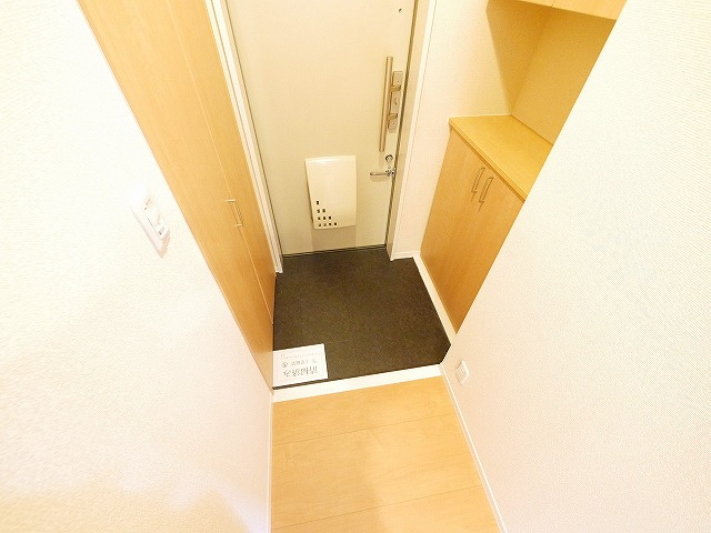 ホワイトヒルズ（梅美台）の玄関