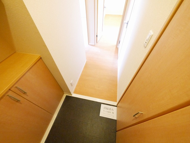 ホワイトヒルズ（梅美台）の玄関