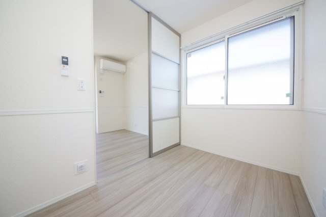 エスペランサ旭A棟の洋室
