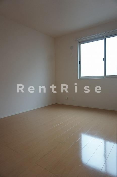 ロイヤルガーデン しおん館 Cの居間・リビング