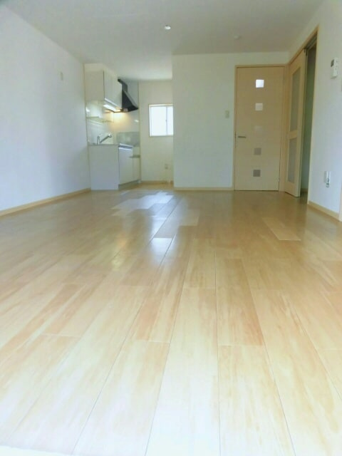 ホワイトルーム飯村 Aの居間・リビング