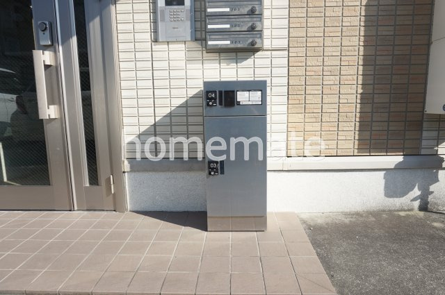 合志市須屋のアパートのエントランス