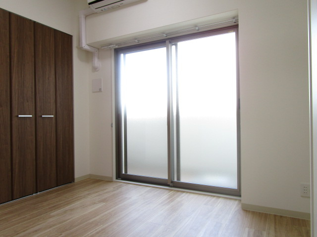 大阪市淀川区三津屋北３丁目の賃貸マンションの寝室