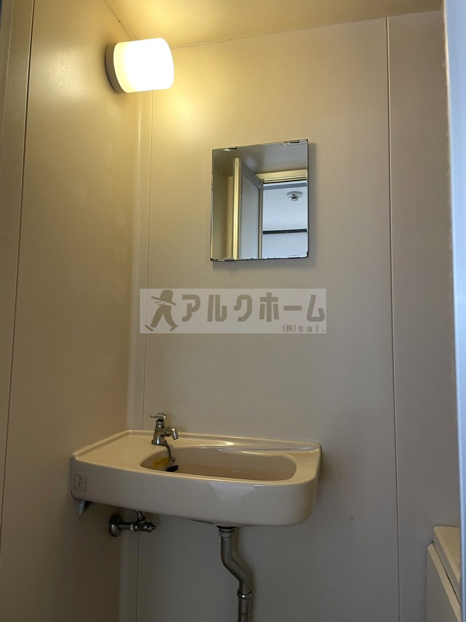 エスト北木の本の洗面所