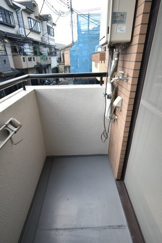 オブリガード西京の設備|洗濯機置き場
