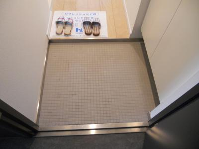 アーバンフラッツ四条西洞院（旧エスティメゾン四条西洞院）の玄関