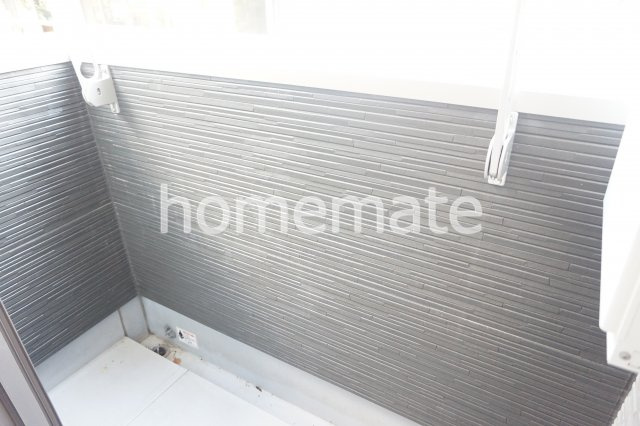 熊本市中央区春竹町大字春竹のアパートのバルコニー