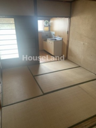 西庄住宅の寝室|落ち着いた色調の寝室です