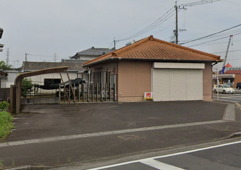都城市宮丸町の住付店舗の外観