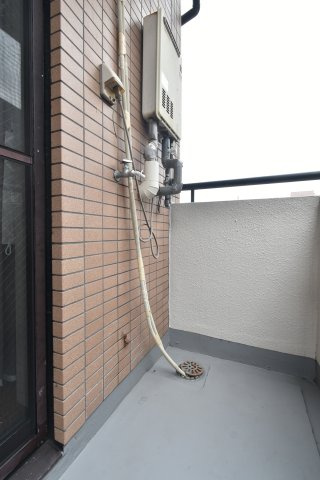 オブリガード西京のその他|洗濯機置場