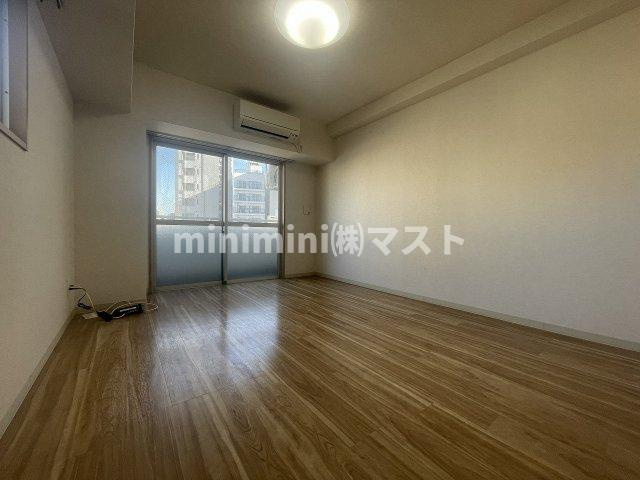 大阪市西区本田３丁目の賃貸マンションの居間・リビング