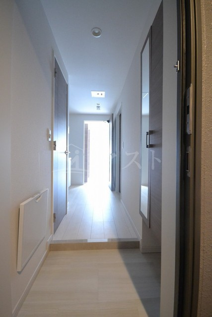 コージーコート釣鐘の玄関