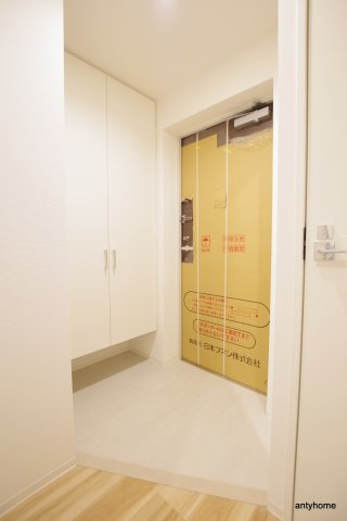 セレニテフラン野田阪神駅前　仲介手数料無料の玄関