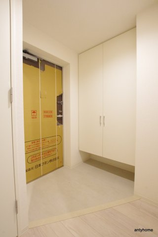 セレニテフラン野田阪神駅前　仲介手数料無料の玄関