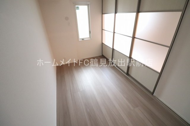 ボヌワール高井田の洋室