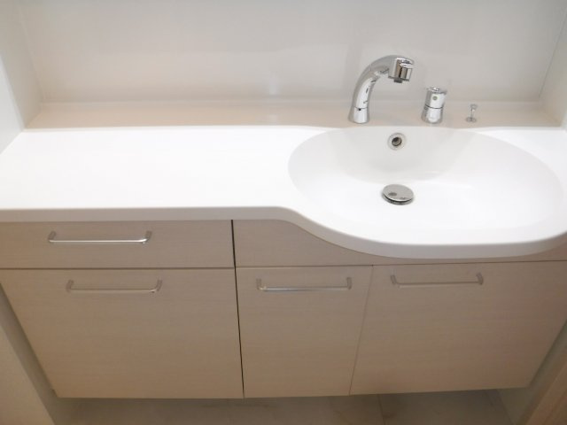 Ｄ－ｒｏｏｍ塚越の洗面所
