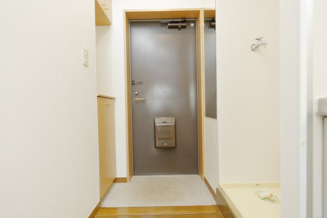 阿部松島マンションの玄関