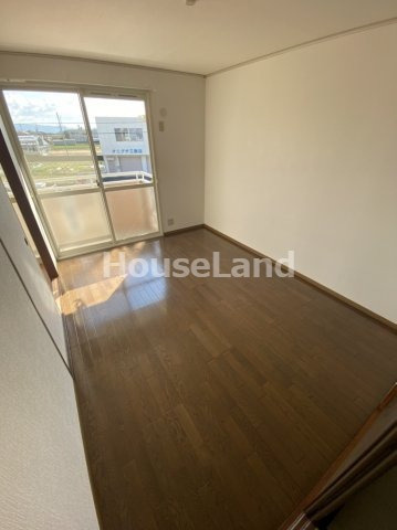 ヤマイチプラザサニータウン園部の居間・リビング