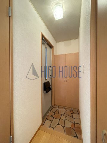 グランシャリオ(今成)の玄関