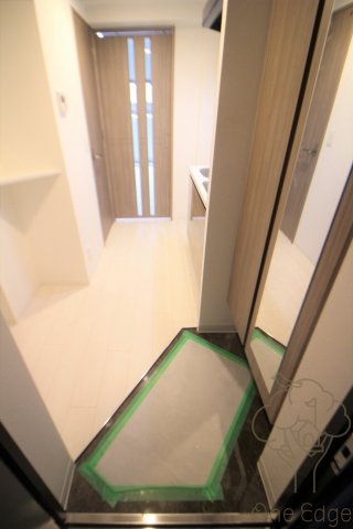 グランデセレジェイラ北梅田ミラージュの玄関