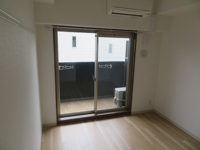 グランカリテ大阪城EASTの寝室