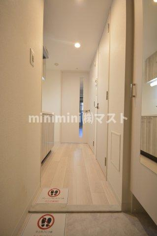 エスリード弁天町グランツの玄関