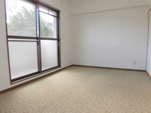 メゾンラフィネの洋室