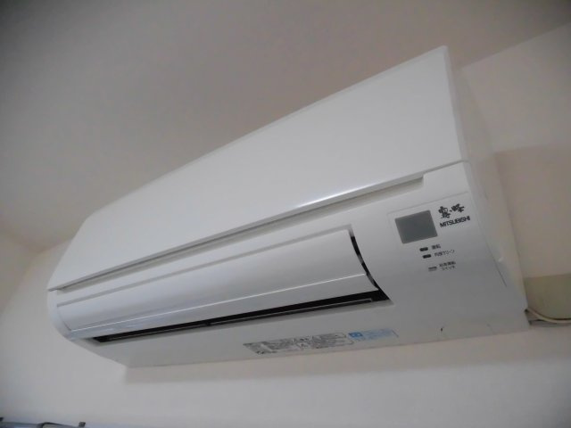 【居間・リビング】 | 徳山駅前スカイマンション | エアコン付きです。