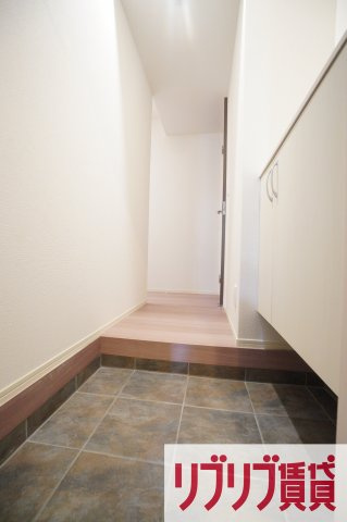 グランデュール春日の玄関