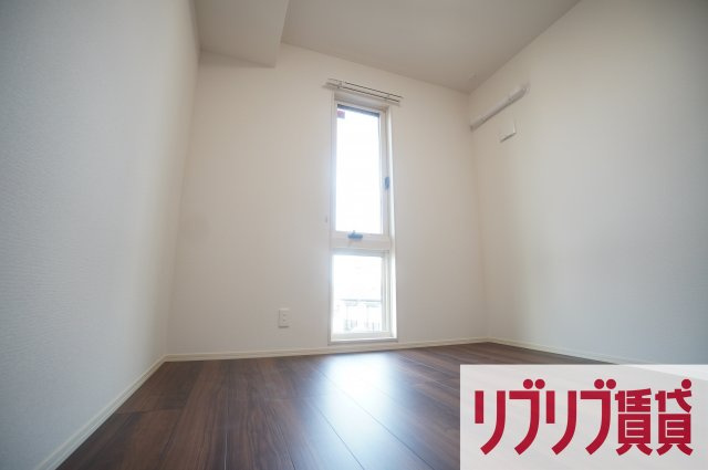 グランデュール春日の寝室