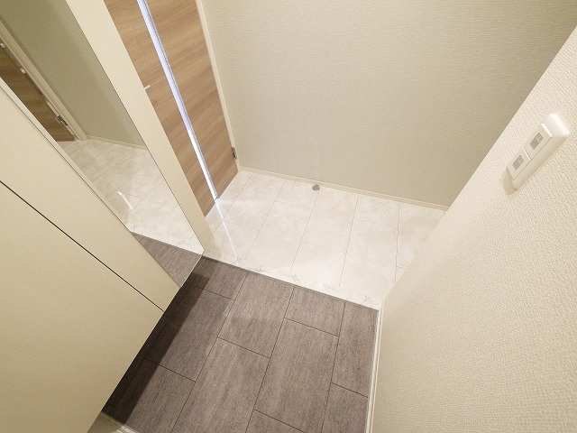 Cuore 都跡の玄関