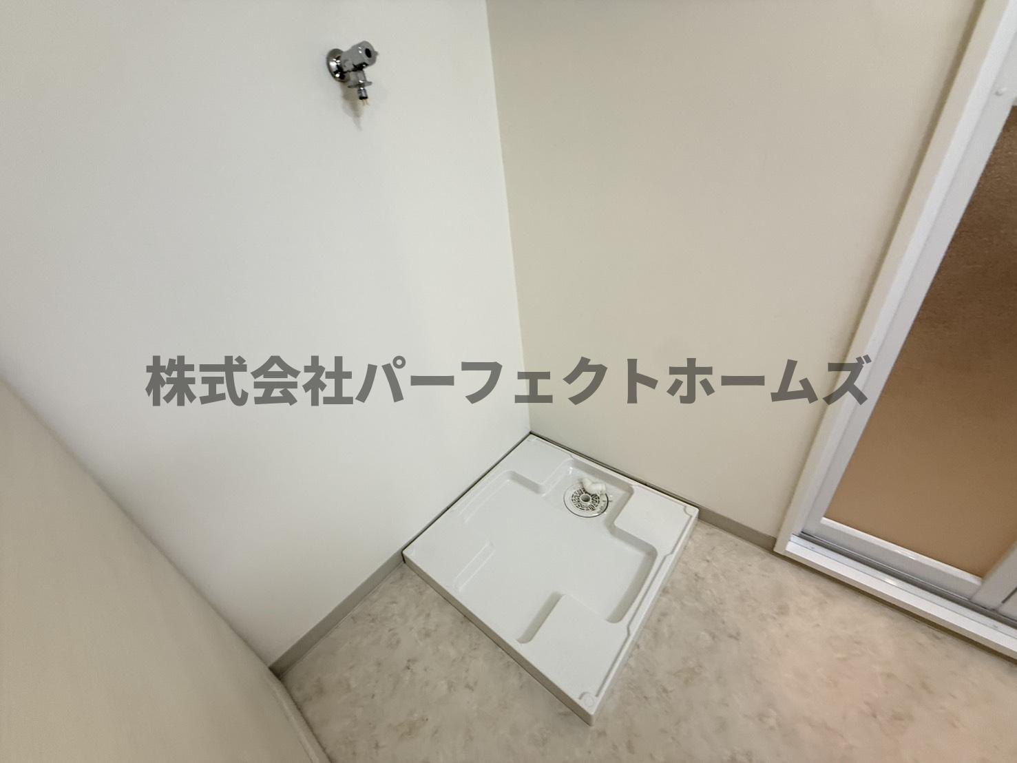 寝屋川サンハイツA棟の設備|洗濯機置場です