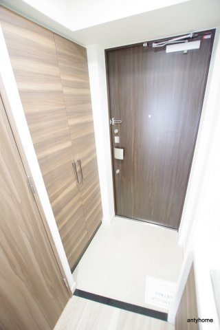 ディームス江坂　仲介手数料無料の玄関