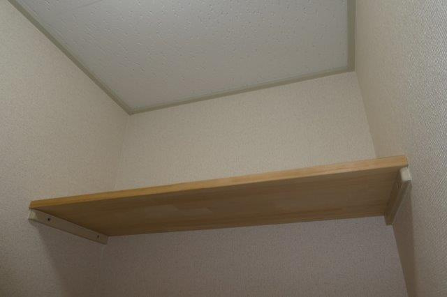 プレジュール須々木の洗面所|洗濯機上棚