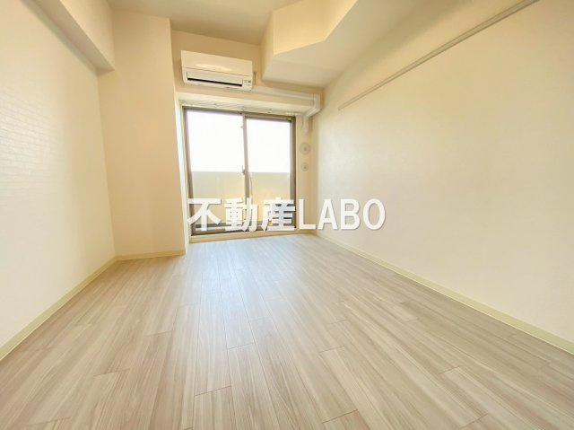 プレサンスOSAKA DOMECITY クロスティの居間・リビング