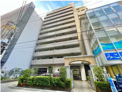 【外観】 | エスリード西天満 | ライトブラウンのタイル貼りの外観が特徴の14階建てのマンションです