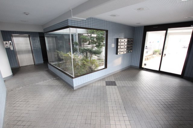 ステイタスマンション桧原のエントランス